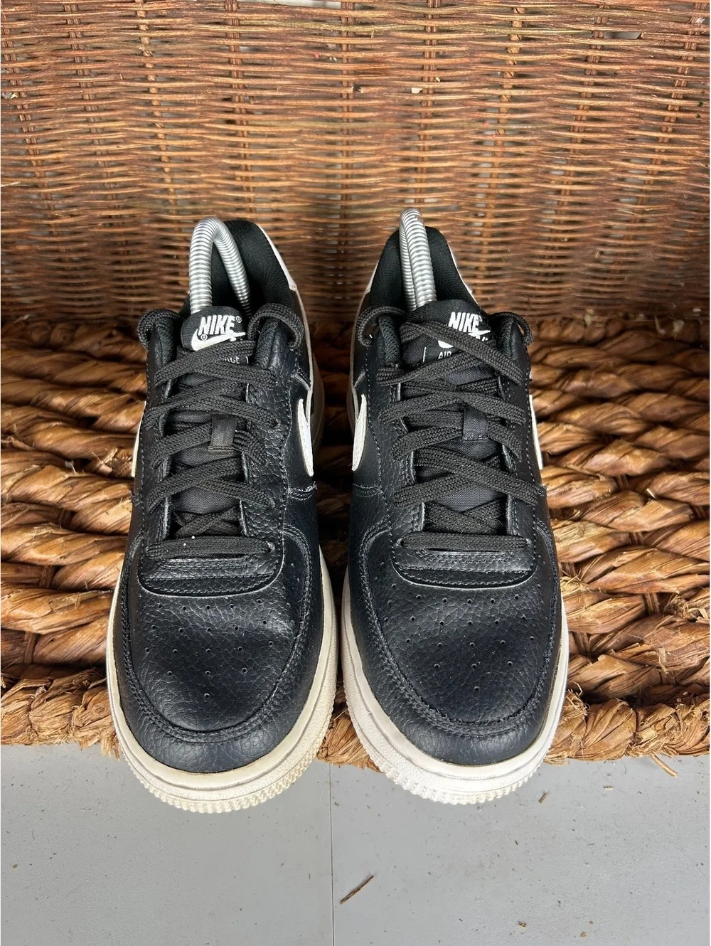 Nike Air Force 1 black and white low sneakers